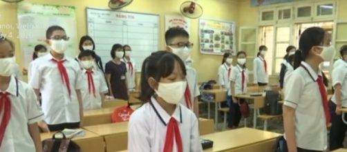 Vietnam children return to class after three-month closure for COVID-19 lockdown. [Image source/South China Morning Post YouTube video]