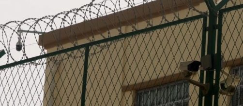 The BBC identified this building in Xinjiang Province as a 'Re-Education Camp" for Uighurs. [Image source: BBC News/YouTube Video]