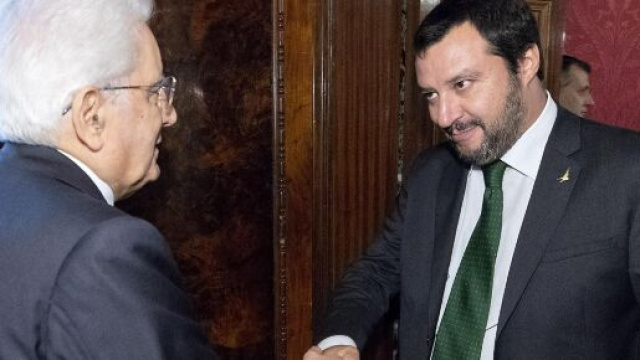 Il capo dello stato Sergio Mattarella e il leader della Lega Salvini