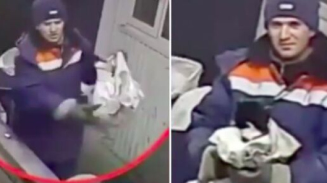 Un chat sauv&eacute; de justesse par un agent de tri - La vid&eacute;o fait le buzz (capture d'&eacute;cran vid&eacute;o)