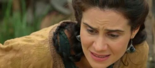 Amat d&aacute; &agrave; luz em "G&ecirc;nesis". (Reprodu&ccedil;&atilde;o/RecordTV)