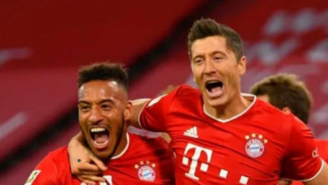 Nella foto Tolisso e Lewandowski.