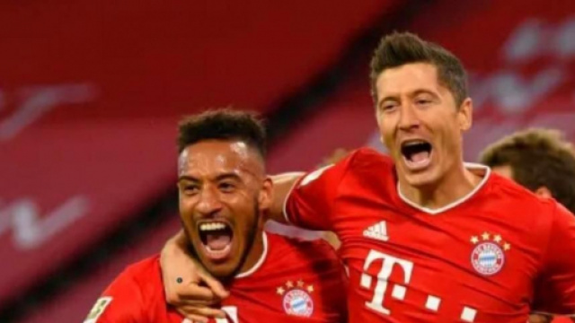 Nella foto Tolisso e Lewandowski.