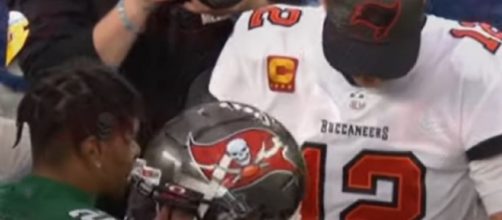 Brady obliged to Echols' request for an autograph (Image source: Touch Down/YouTube)