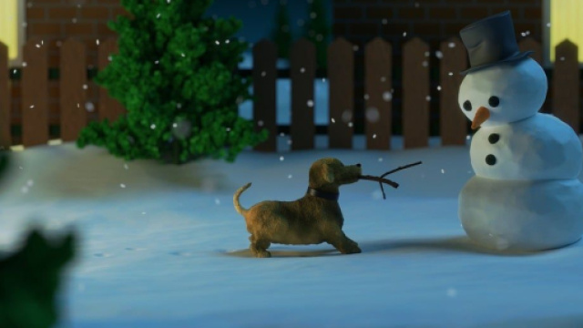 Cagnolino che vuole giocare con il pupazzo di neve &copy; Pixabay