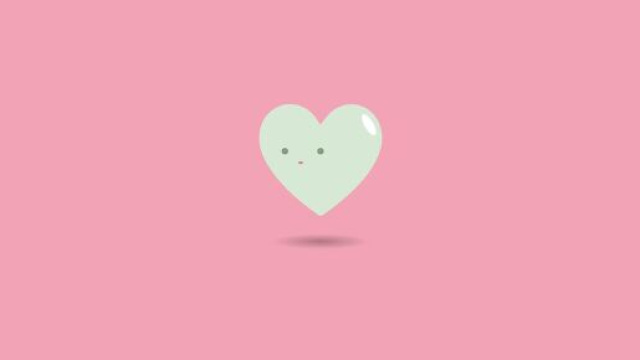 cuore bianco con faccina su sfondo rosa &copy; Pixabay