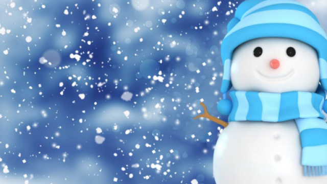 Pupazzo di neve con cappellino e sciarpa - &copy; Pixabay