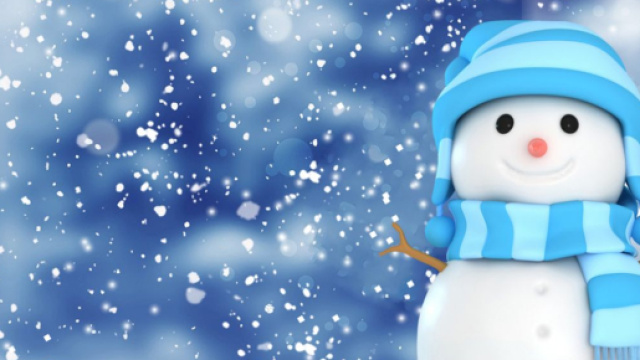 Pupazzo di neve con cappellino e sciarpa - &copy; Pixabay