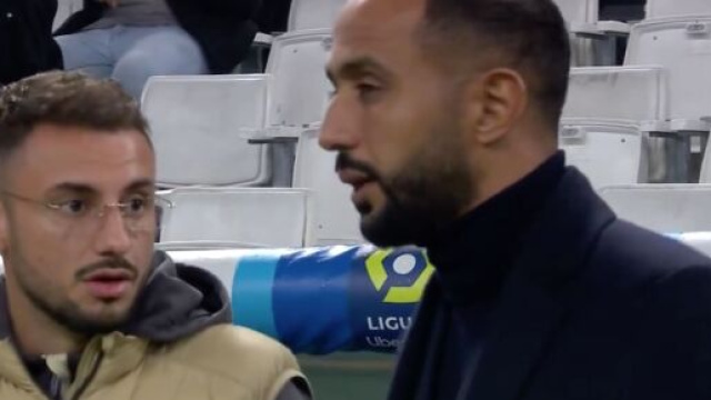 Clauss et Benatia en discussion avant OM-Nantes. (screenshot twitter @PVSportFR)