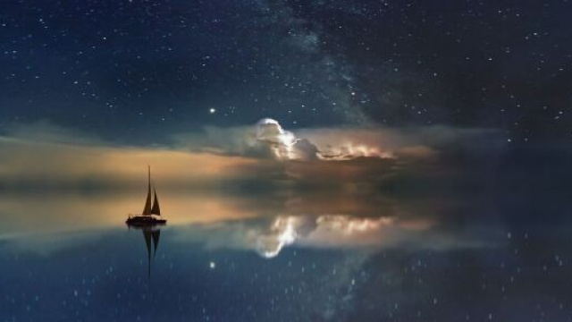 Oroscopo, una barca e un cielo stellato (&copy;pixabay.com)