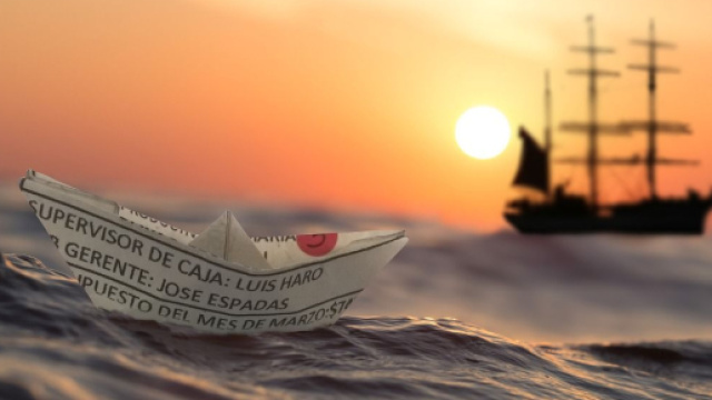 Una barchetta di carta sull'oceano &copy; Pixabay.