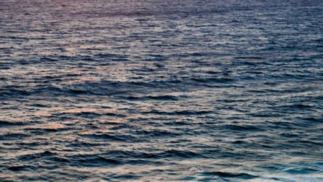 Spiaggia al tramonto &copy; Pexels.com