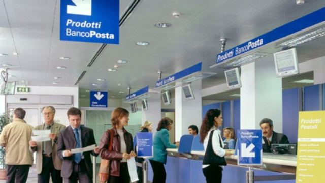 In foto degli impiegati di &copy; Poste Italiane.