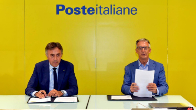 In foto dirigenti di Poste &copy; Poste italiane