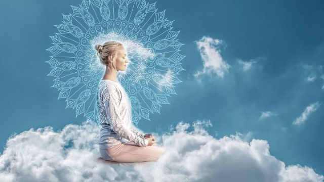 Figura femminile in meditazione yoga - &copy; Pixabay IA.