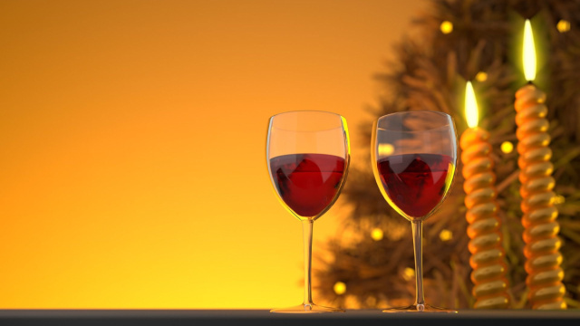 Calici di vino rosso con candele e tramonto - &copy; Pixabay.