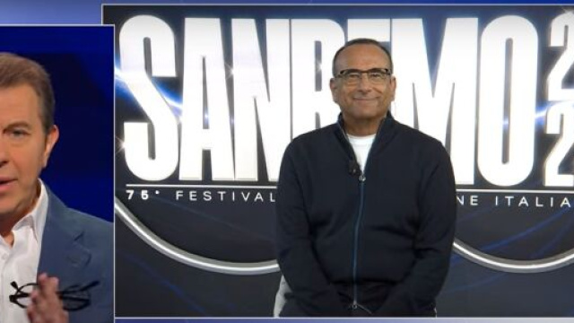 Carlo Conti durante un'intervista con Francesco Giorgino &copy; screenshot Rai 1.