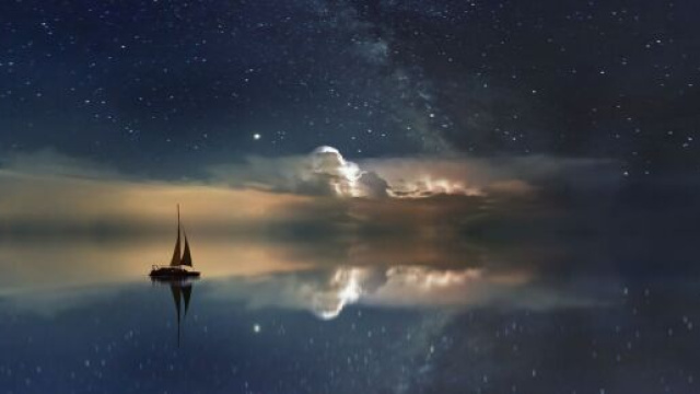 Barca sotto a un cielo stellato &copy; pixabay