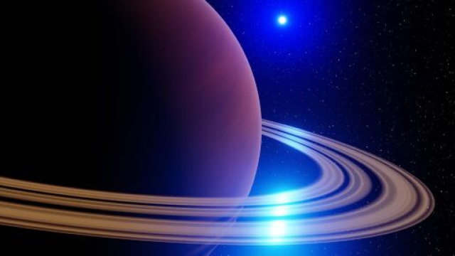 Saturno con anelli e Sole in lontananza - &copy; Pixabay