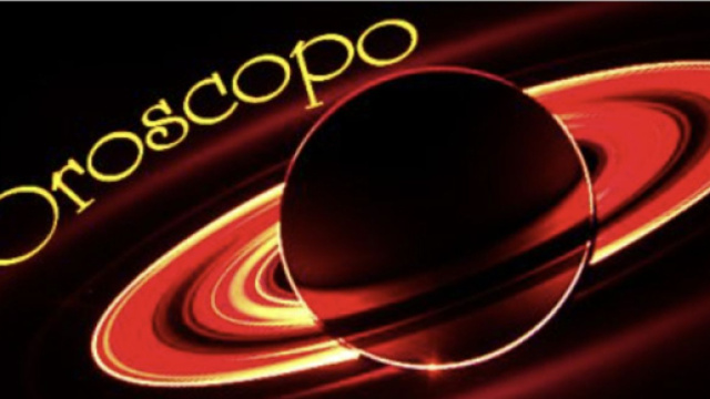Saturno con anelli e scritta &copy; Roberta Carsoli