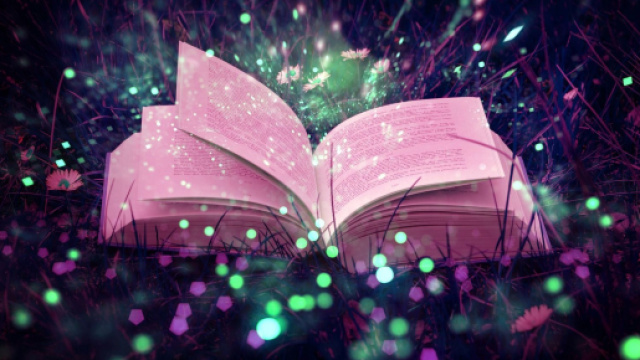 Libro aperto in un prato luccicante - &copy; Pixabay IA.