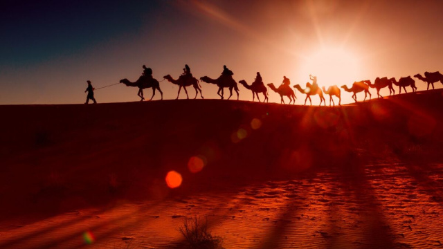 Arab people with camel caravan. Designed by Freepik