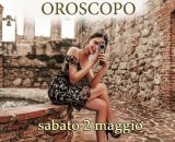 Locandina per l'oroscopo di sabato 2 maggio 2026 - &copy; Copilot IA.