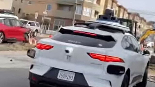 Waymo self driving car almost drives into a trench at construction ... &copy; Creative Commons