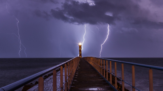 File:Port and lighthouse overnight storm with lightning in Port-la ... &copy; Creative Commons