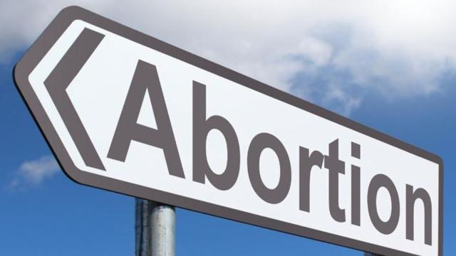 UK Prime Minister Theresa May is under pressure over Northern Ireland abortion