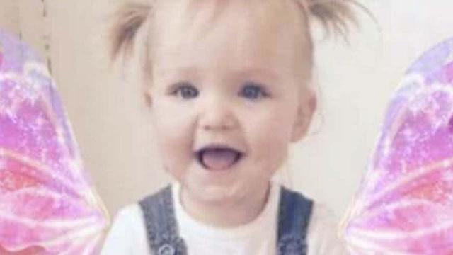 Couple facing charges after toddler, tied up in a caged cot, dies